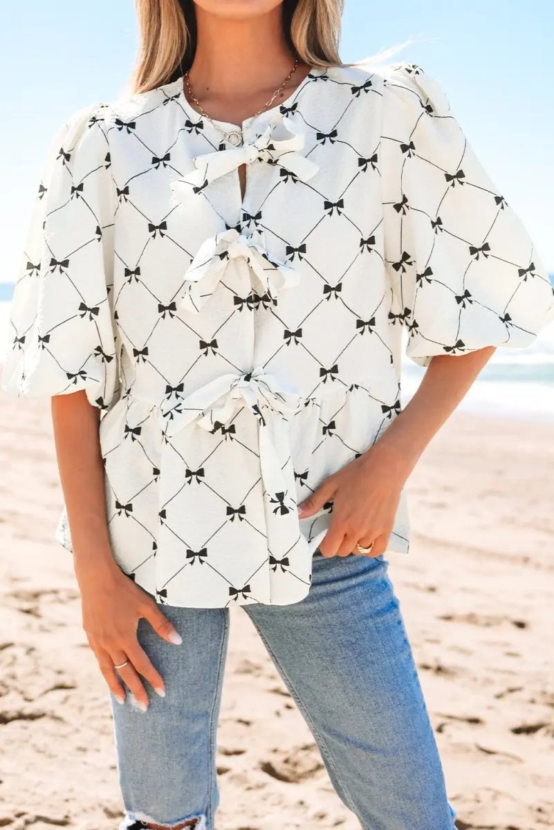 Charming White Bowknot Print Bubble Sleeve Blouse with Front Knots - Love Salve 