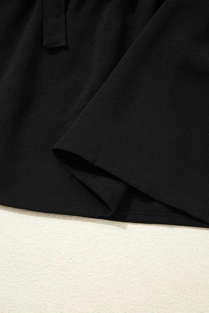 Chic Black Peplum Blouse with Puff Sleeves and Bowknot Detail - Love Salve 