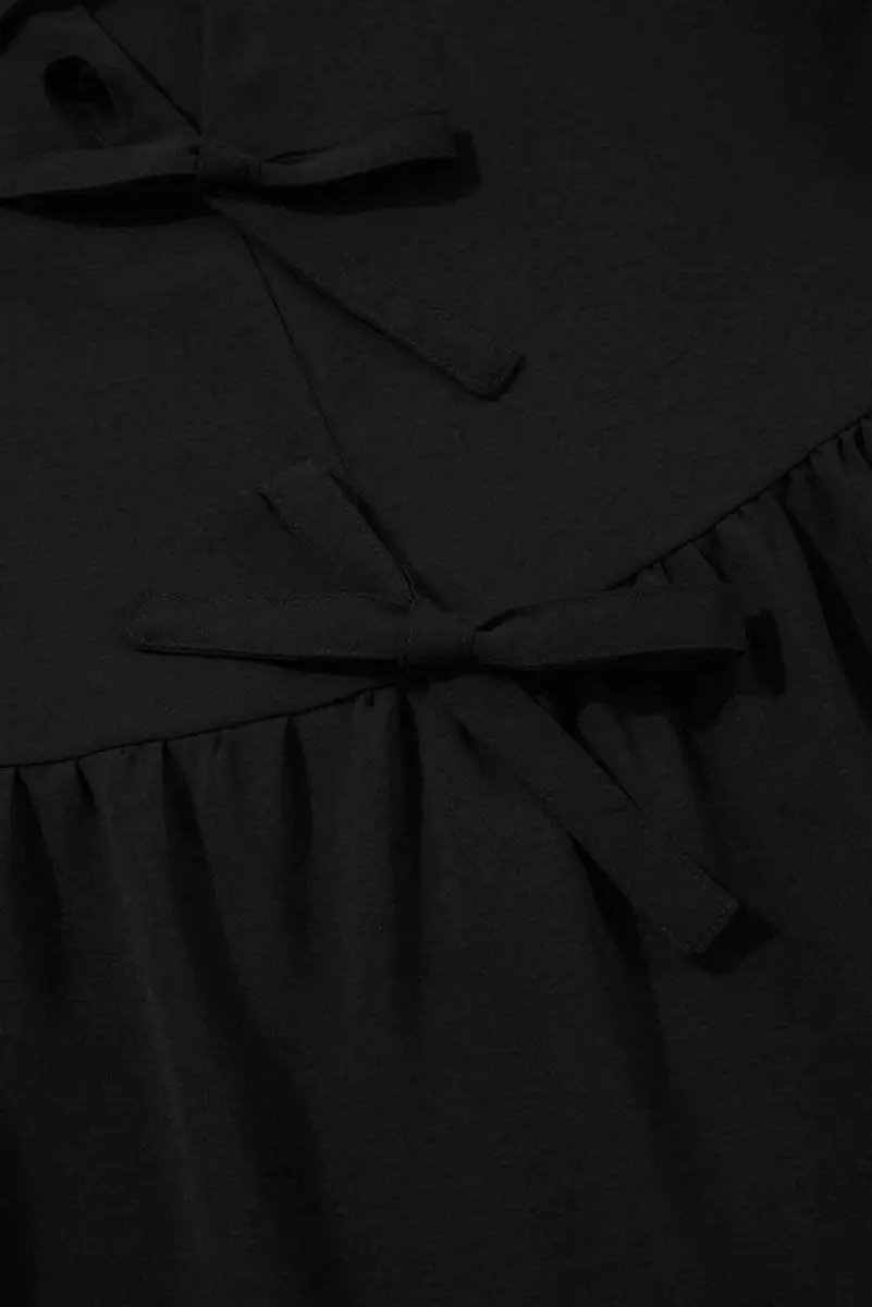 Chic Black Peplum Blouse with Puff Sleeves and Bowknot Detail - Love Salve 