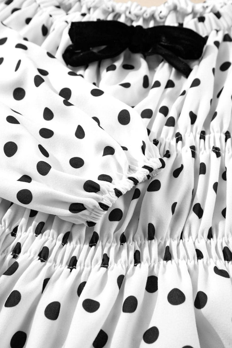 Chic Black Polka Dot Puff Sleeve Peplum Top with Bow Detail - Love Salve 