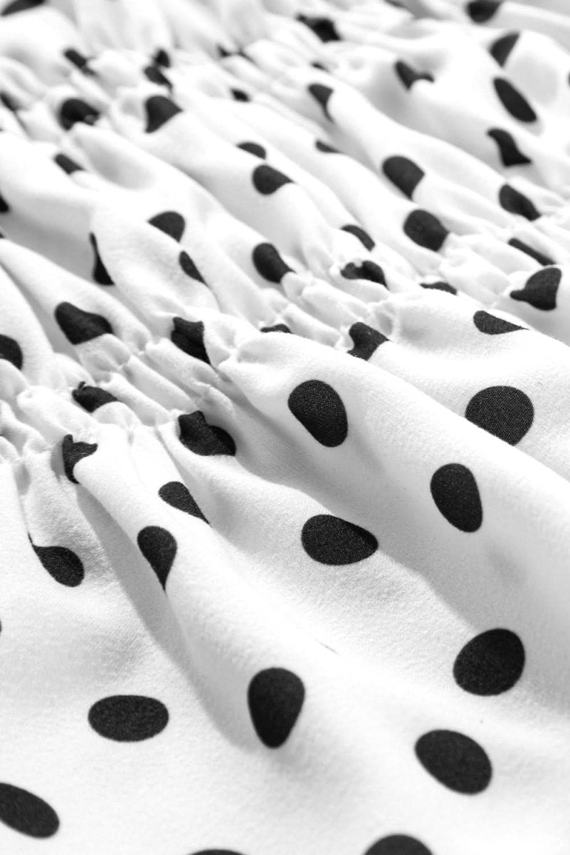Chic Black Polka Dot Puff Sleeve Peplum Top with Bow Detail - Love Salve 