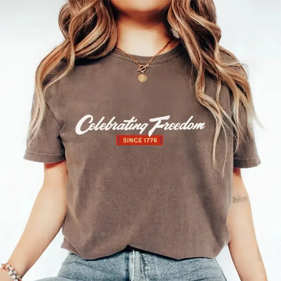Close-up of the Adorb.co "Celebrating Freedom Since 1776" graphic on the patriotic cotton t-shirt.