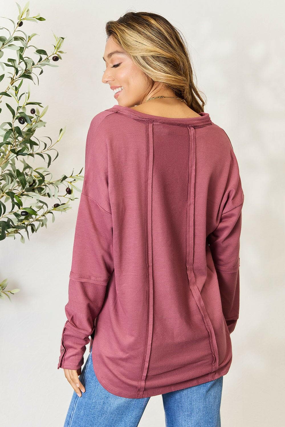 Elegant Vibe V-Neck Exposed Seam Long Sleeve BlouseDiscover the Elegant Vibe V-Neck Exposed Seam Long Sleeve Blouse
 Elevate your wardrobe with the Elegant Vibe V-Neck Exposed Seam Long Sleeve Blouse, a perfect blendLove Salve -Neck Exposed Seam Long Sleeve BlouseTIKTOK