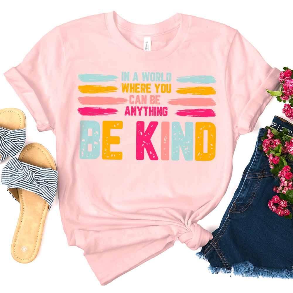 Adorb.co Be Kind Tee, neatly folded to display the vibrant graphic and soft material, a perfect addition to comfort wear coll