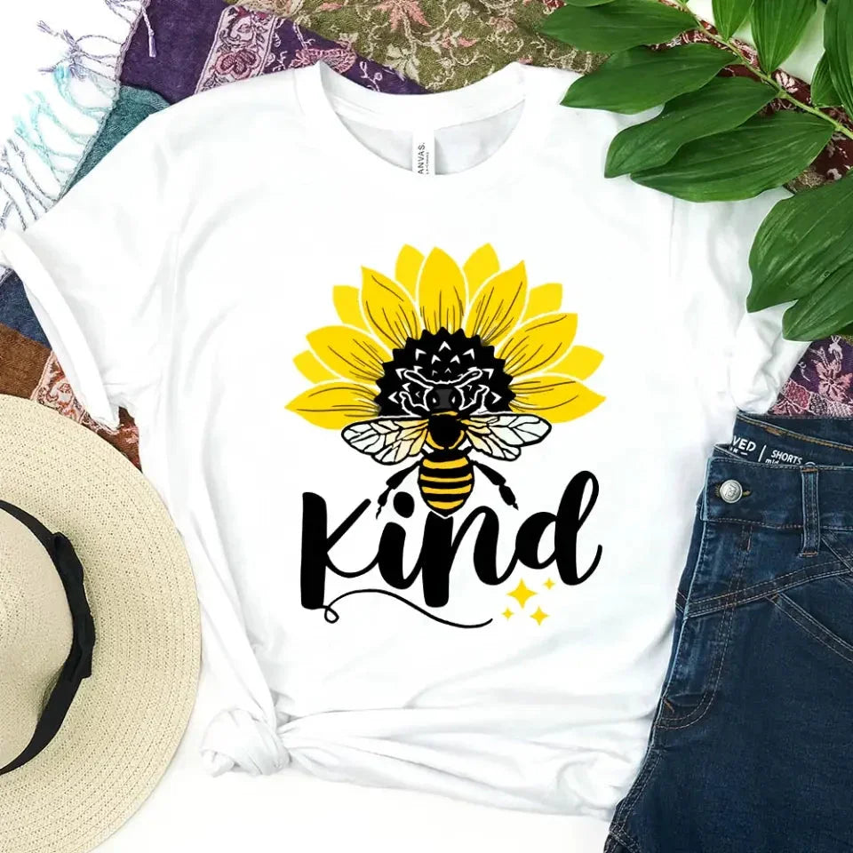 Adorb.co Bee Kind Sunflower Graphic Tee, a detailed close-up of the vibrant 'Bee Kind' sunflower design and text.