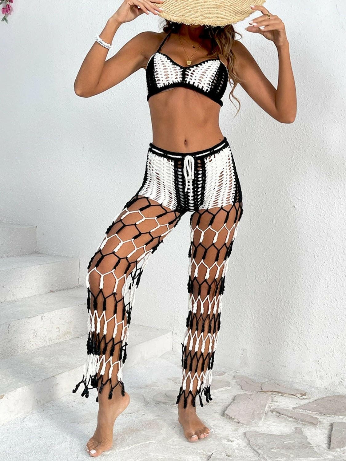 Chic cutout halter neck top swimwear set with unique design and crochet pants.