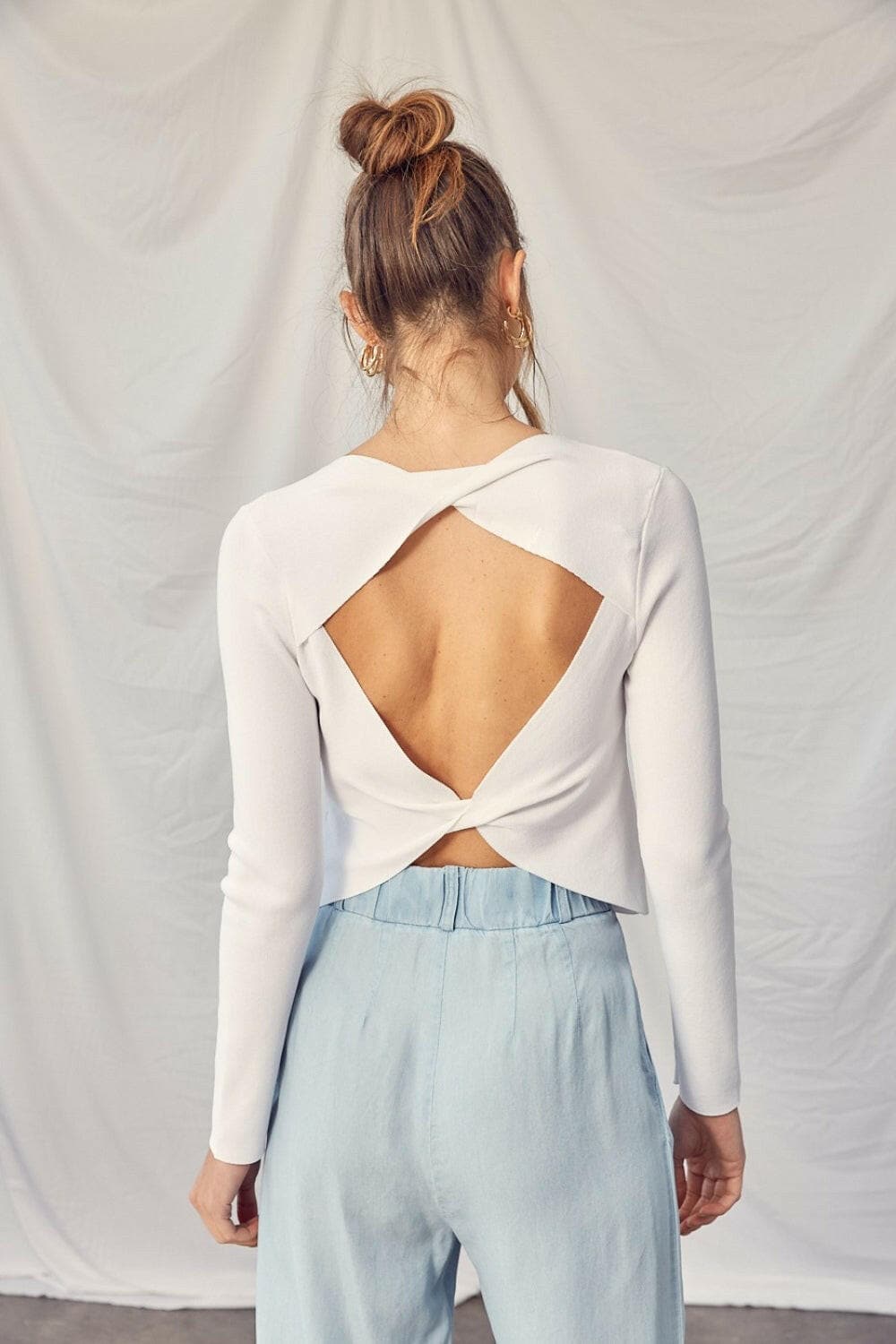 Idem Ditto Twisted Backless Long Sleeve Knit Top.