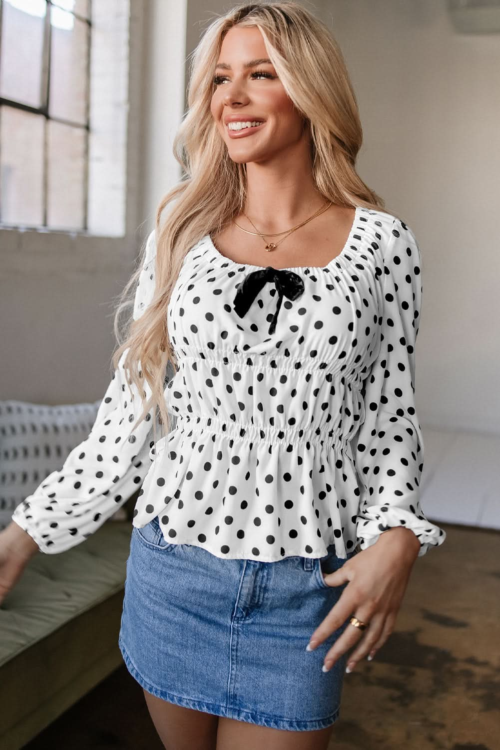 Chic Black Polka Dot Puff Sleeve Peplum Top with Bow Detail