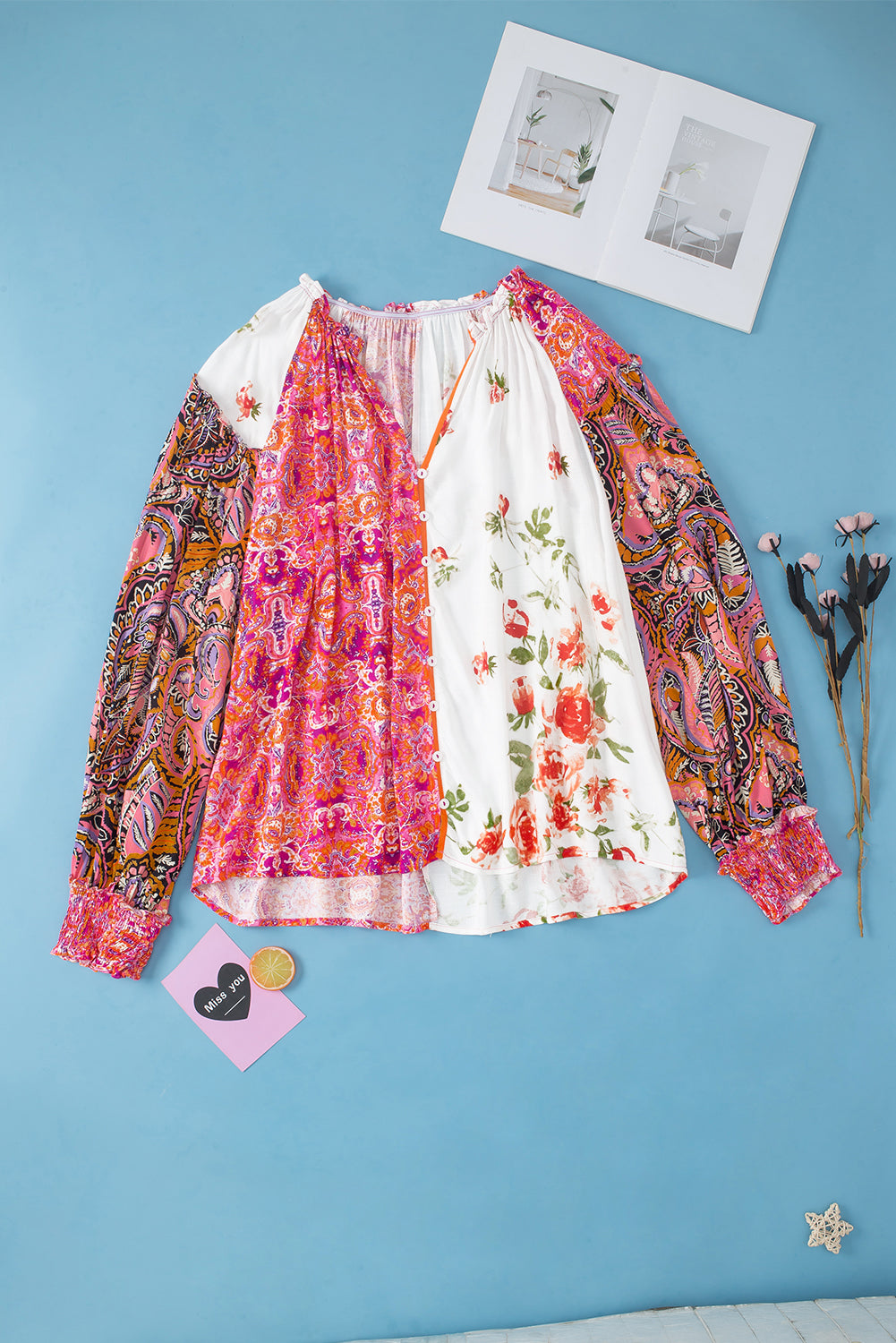 Floral charm: Pink patchwork blouse with shirred cuffs