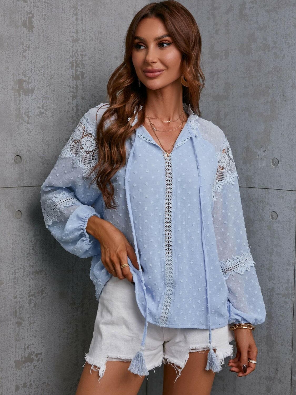 Crochet Tassel Tie Neck Long Sleeve Blouse.