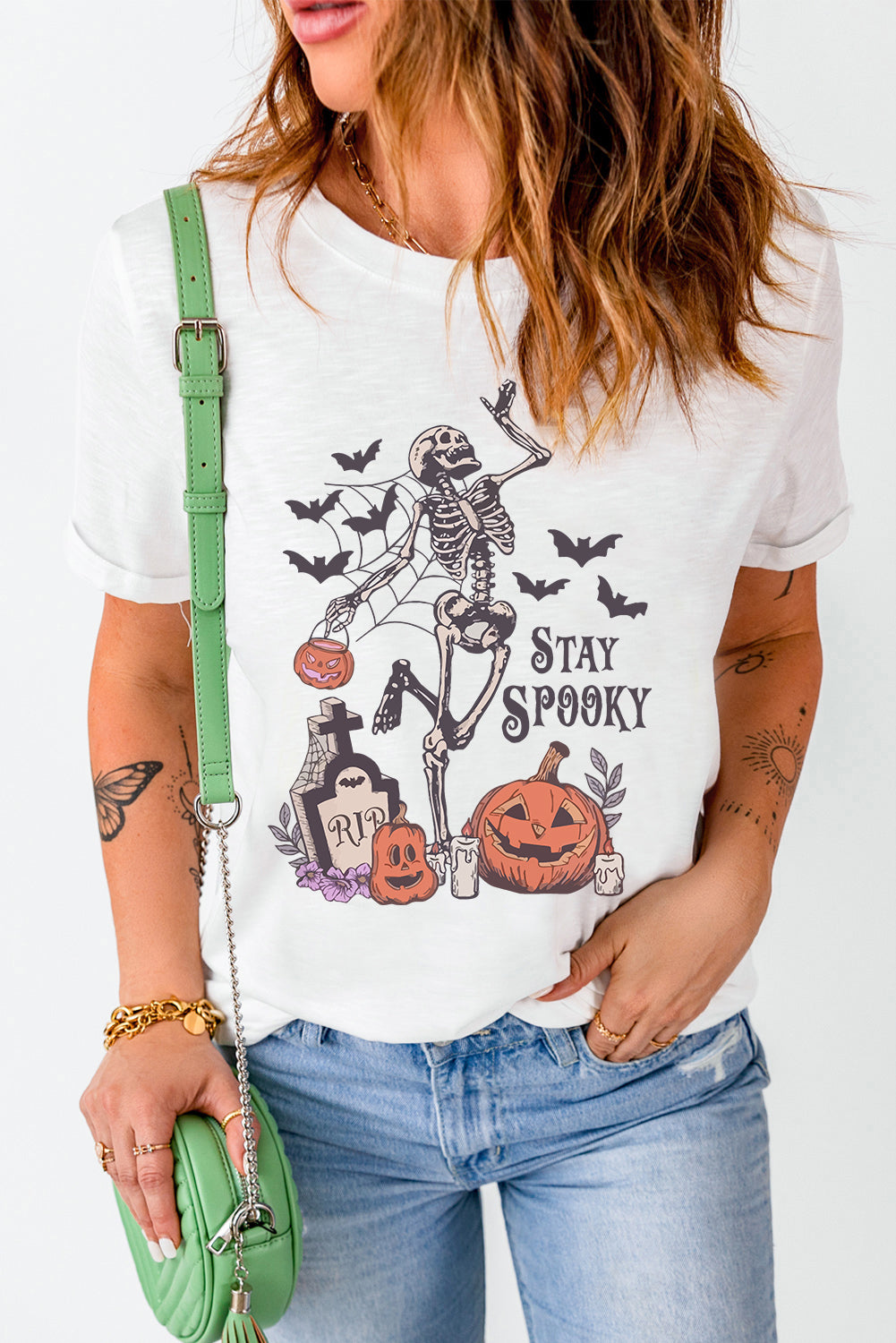 Stay spooky graphic tee featuring a skull pumpkin design for Halloween fun