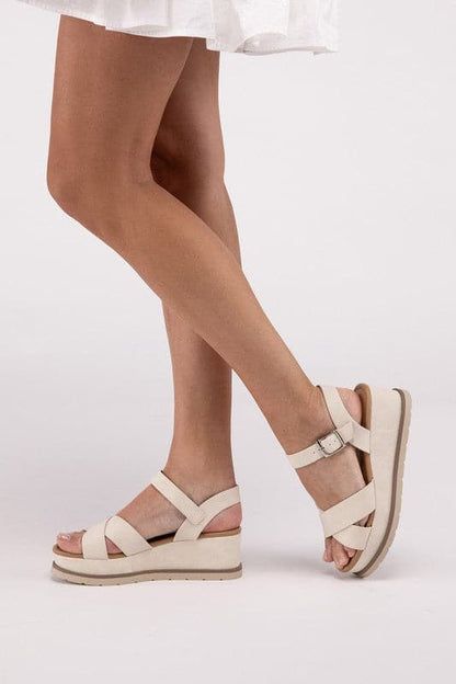 Clever-S Cross Strap Wedge Sandals.