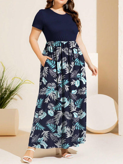 Plus Size Printed Round Neck Short Sleeve Maxi DressUpgrade Your Style with our Plus Size Printed Maxi Dress
 
 
Pattern Type: Eye-catching prints for a trendy look
 
Style: Effortlessly casual, perfect for various ocLove Salve Size Printed Round Neck Short Sleeve Maxi Dressplus