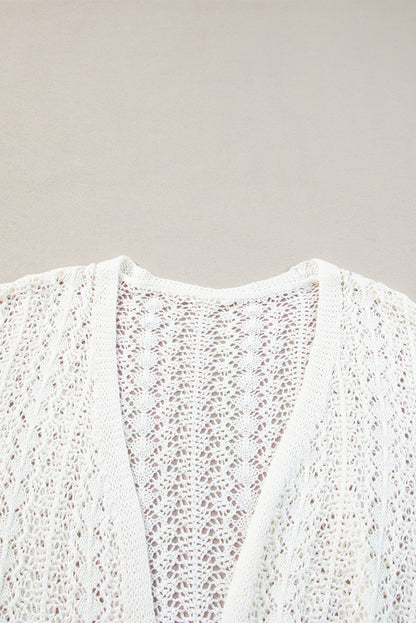 Chic white knit cardigan with hollow out details and drop shoulder design