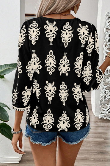 Timeless black geometric print V-neck blouse with 3/4 sleeves