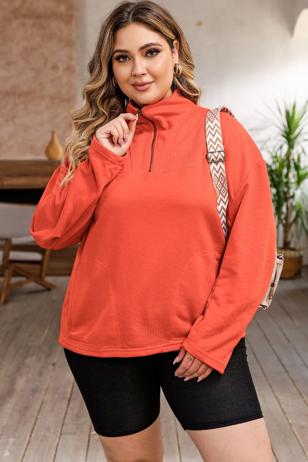 Chic orange o-ring zip pocket sweatshirt for plus size comfort