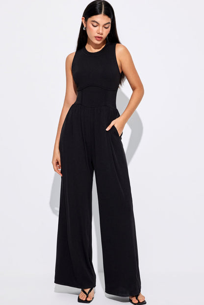 Chic black sleeveless jumpsuit with cinched waist and wide legs