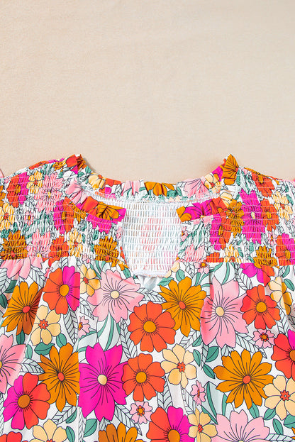 Vibrant floral plus-size ruffle sleeve blouse with notched neckline