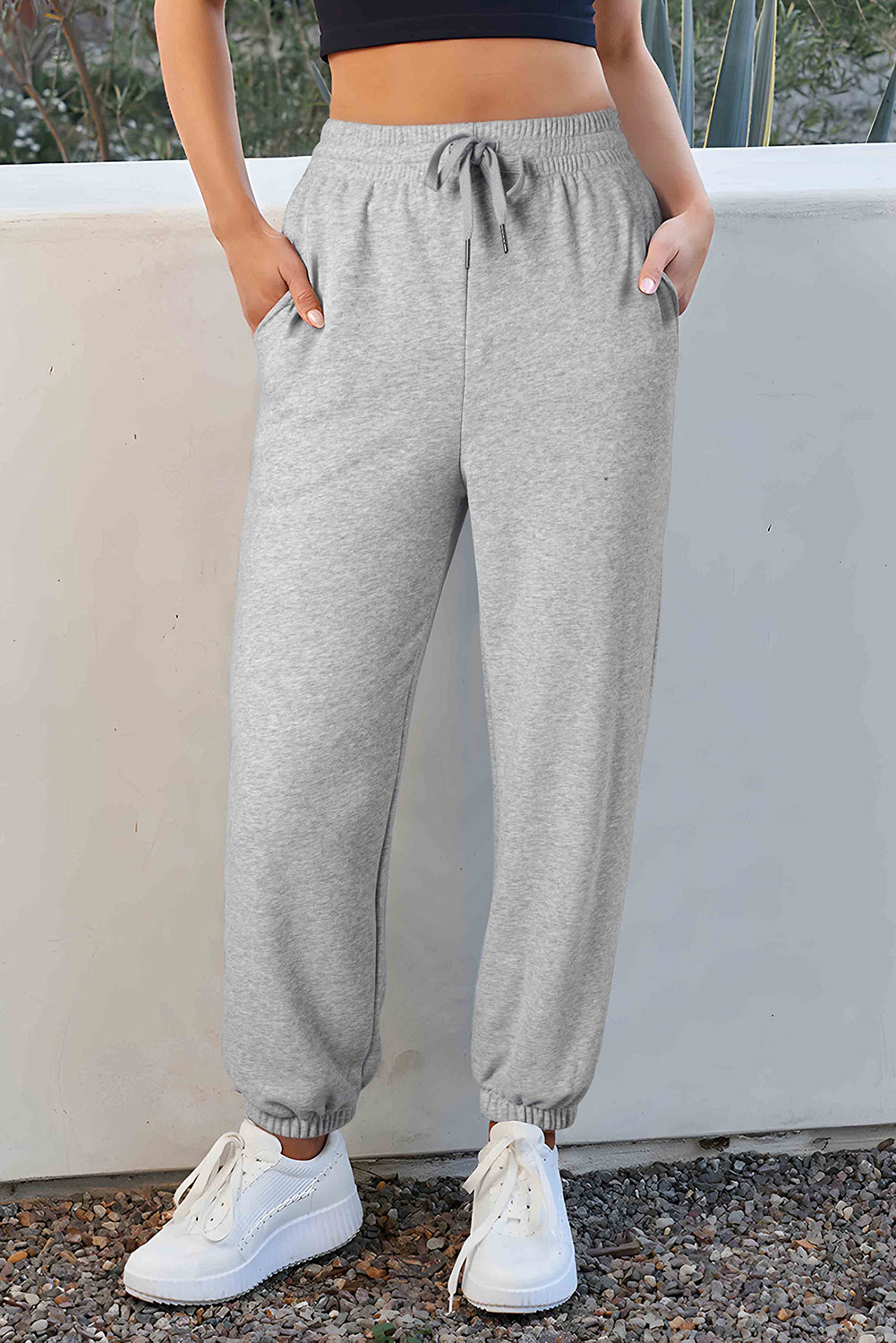 Cozy light grey fleece-lined joggers with adjustable drawstring waist