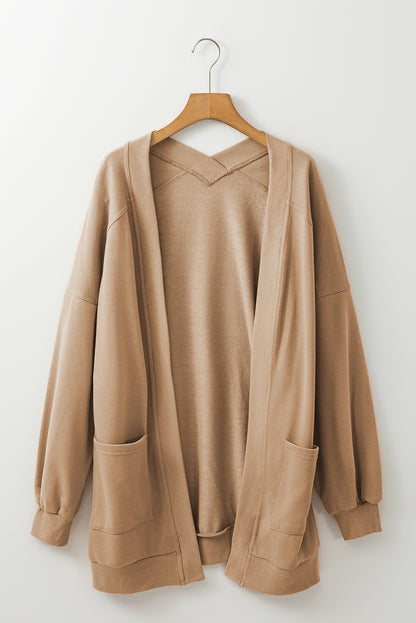 Light Beige Ribbed Knit Cardigan with Exposed Seams and Pockets