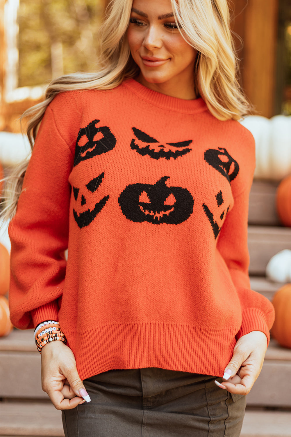 Spooky pumpkin face drop shoulder sweater for Halloween fun