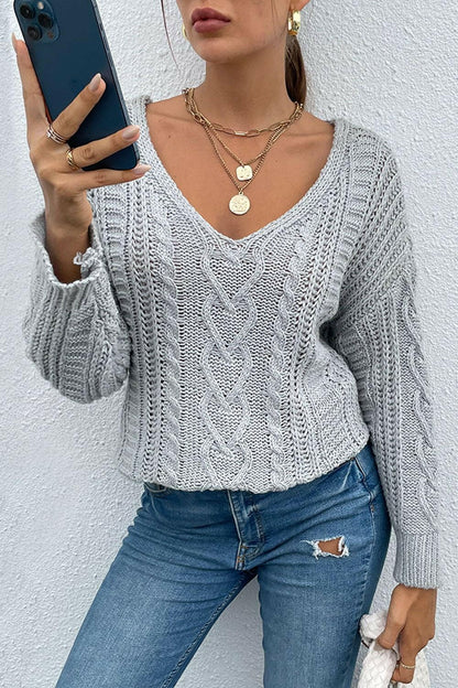 V-Neck Cable-Knit Long Sleeve SweaterV-Neck Cable-Knit Long Sleeve Sweater
 Indulge in cozy sophistication with our V-Neck Cable-Knit Long Sleeve Sweater. Crafted from 100% acrylic with a moderate stretLove Salve -Neck Cable-Knit Long Sleeve Sweatercloseout