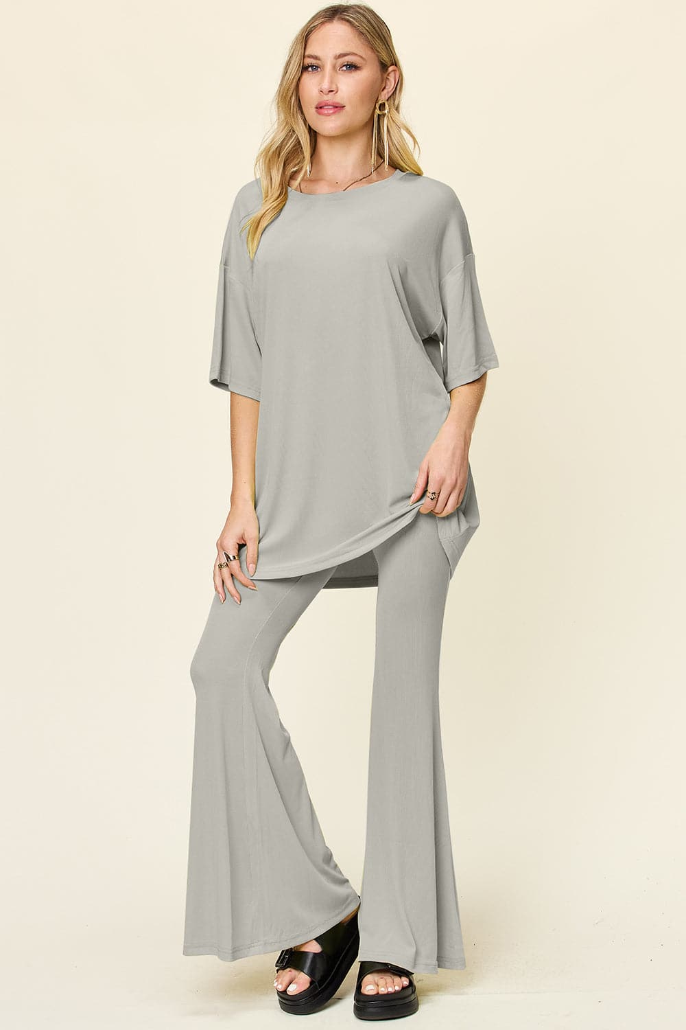 Double Take Full Size Round Neck Drop Shoulder T-Shirt and Flare Pants Set.