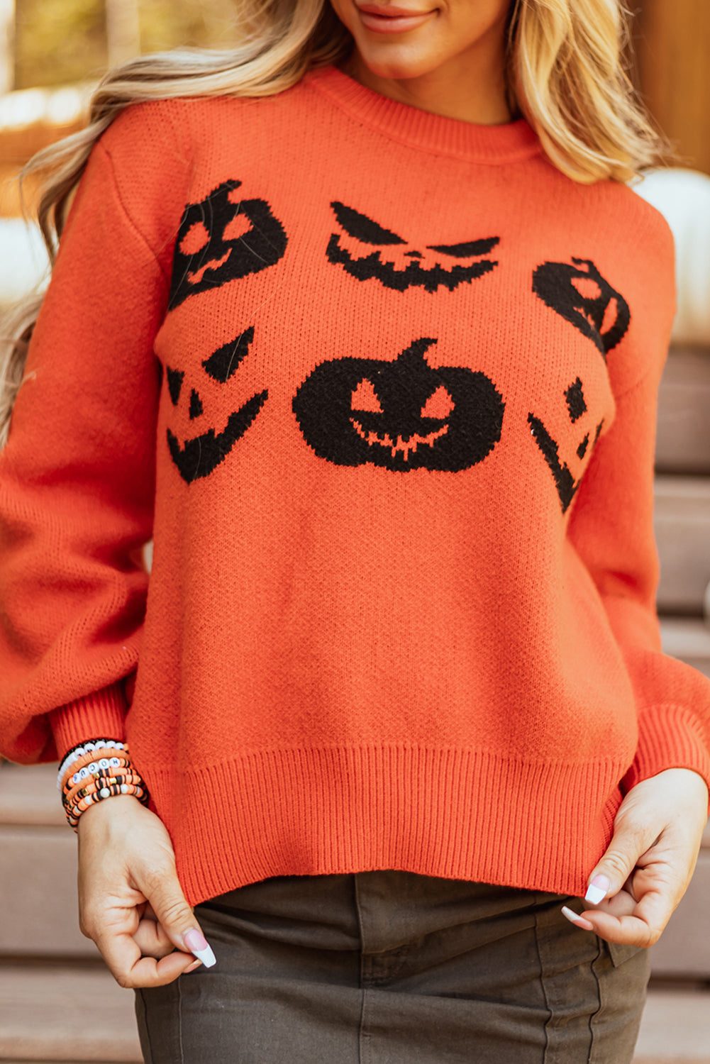 Spooky pumpkin face drop shoulder sweater for Halloween fun