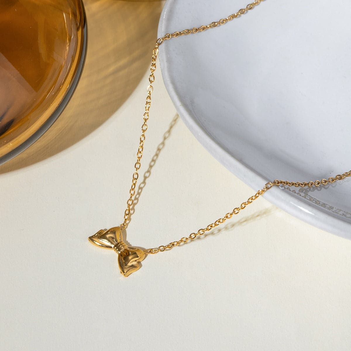 18K Gold-Plated Stainless Steel Bow Necklace.