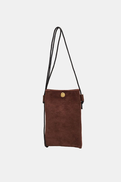 Chic mini suede crossbody bag with snap closure