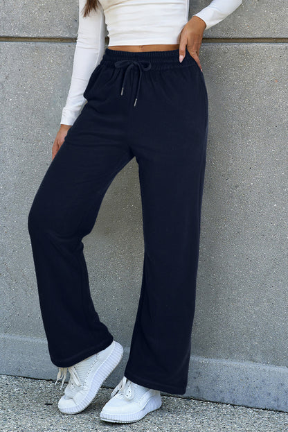 Navy blue fleece-lined casual pants with drawstring waist