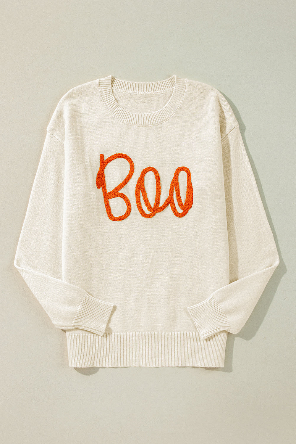 Cozy apricot "Boo" ribbed edge drop shoulder sweater