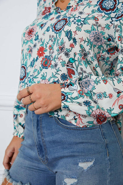 Floral Notched Long Sleeve Blouse.