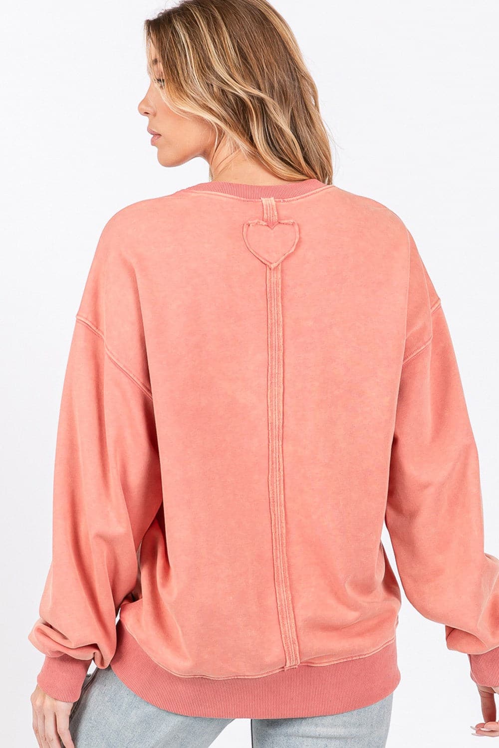 Love-inspired drop shoulder sweatshirt with playful applique details