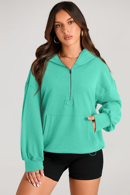 Sheer pocketed half zip hoodie for a stylish look