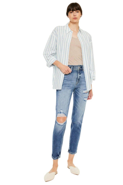 Kancan high rise distressed mom jeans with trendy rips and vintage wash.