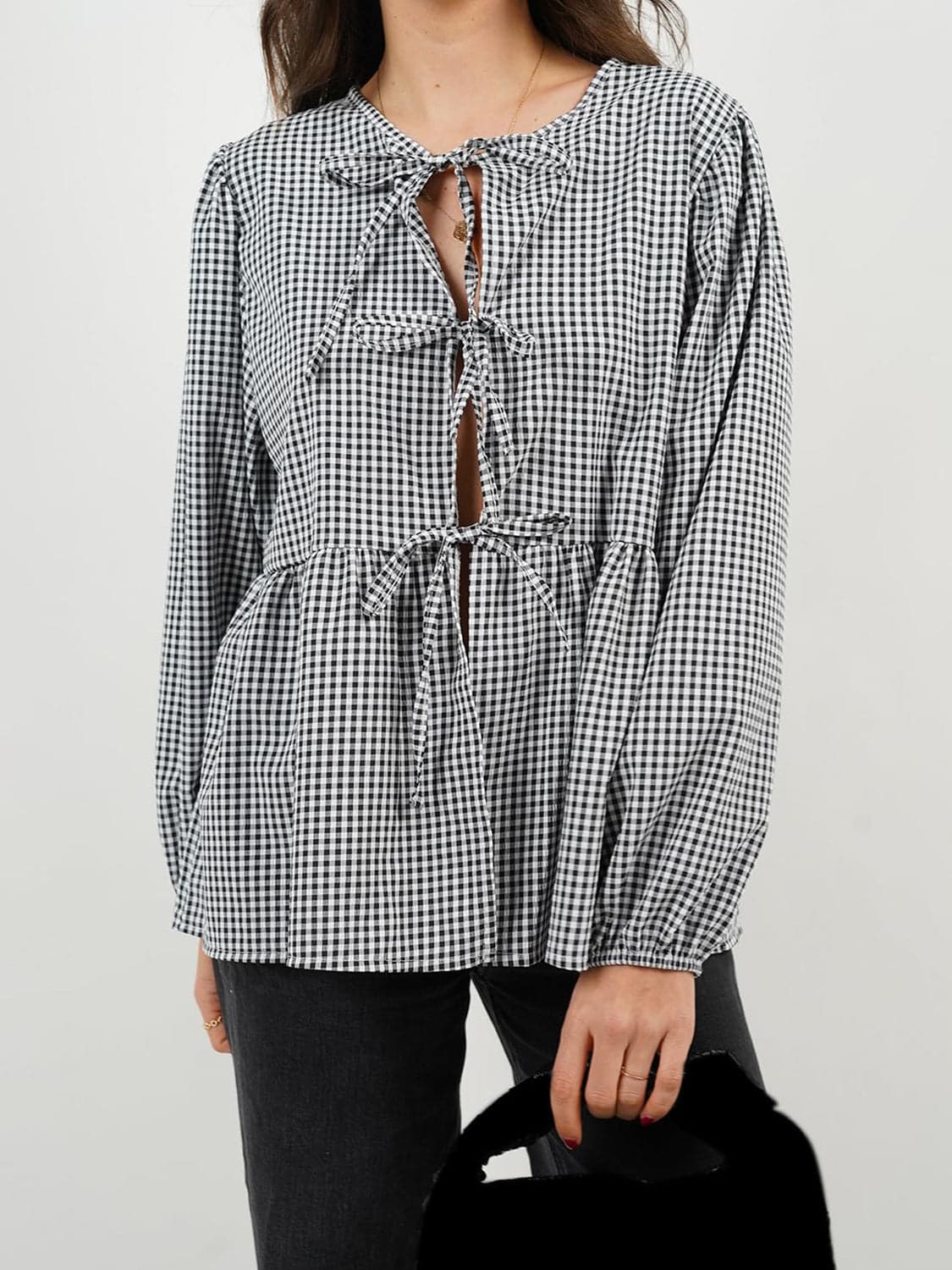 Tied Round Neck Long Sleeve Blouse.