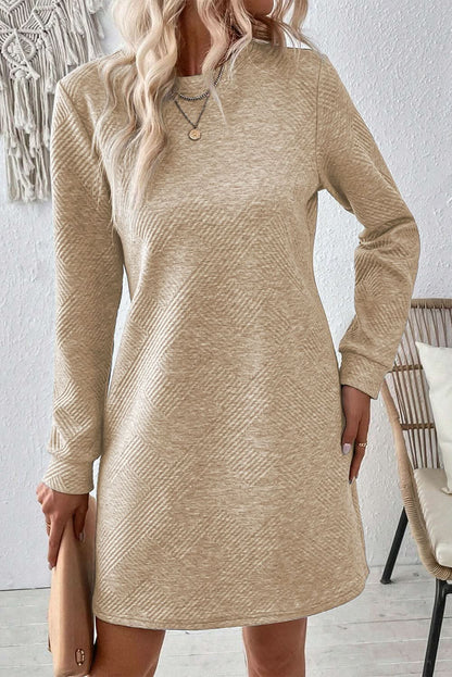 Textured long sleeve mini dress with round neck