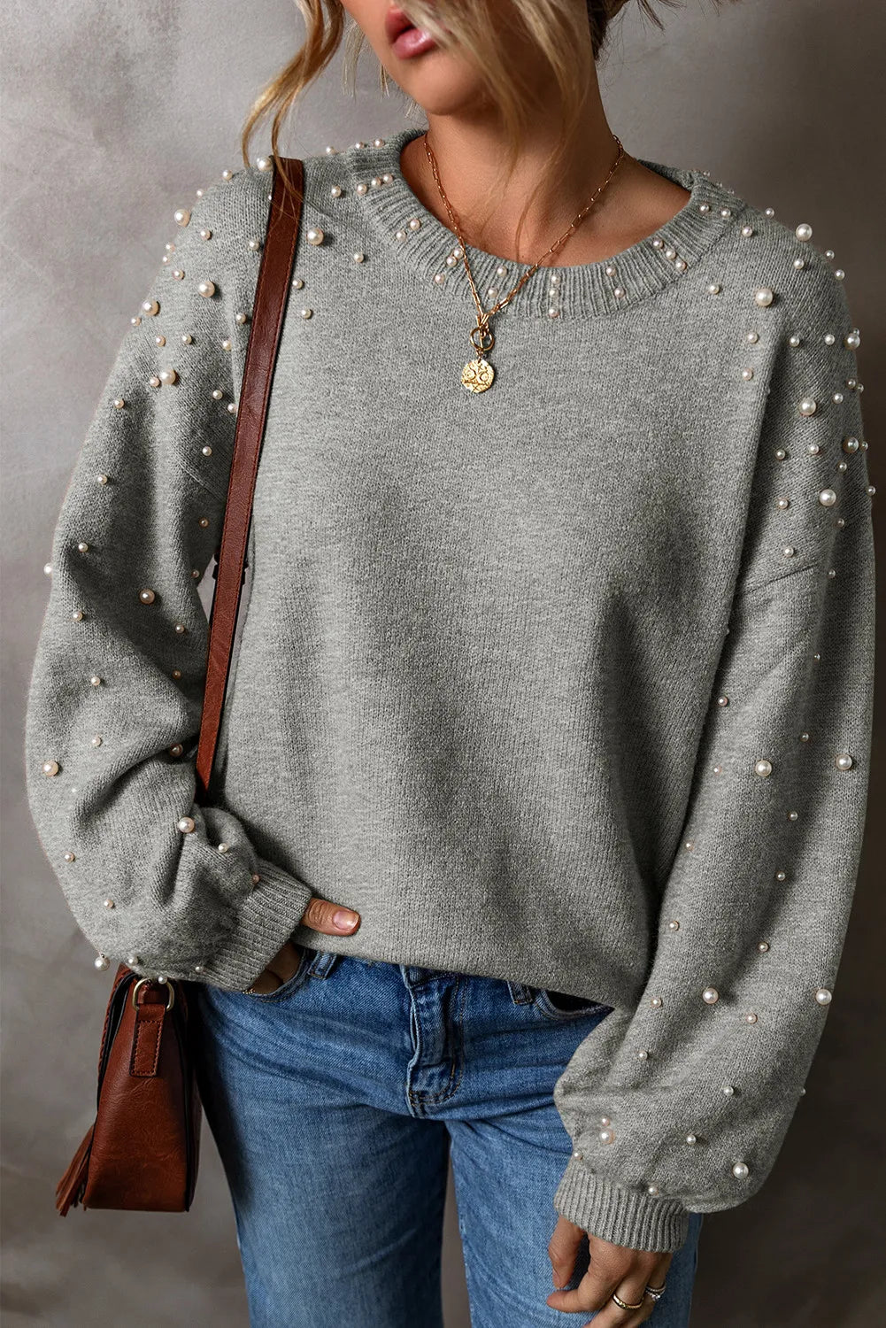 Chic pearl-embellished knit sweater