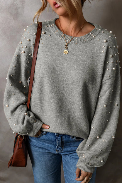 Chic pearl-embellished round neck long sleeve knit sweater