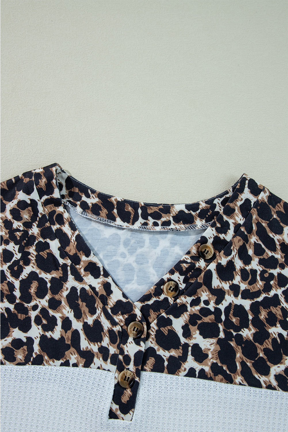 White leopard v-neck knit top