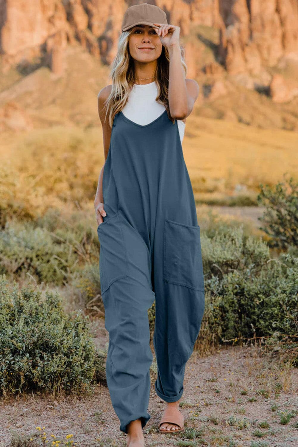 Double Take Full Size V-Neck Sleeveless Jumpsuit with PocketsUpgrade Your Style
 Introducing the Double Take Full Size V-Neck Sleeveless Jumpsuit with Pockets – where fashion meets functionality! This chic jumpsuit is designedLove Salve -Neck Sleeveless Jumpsuitusa