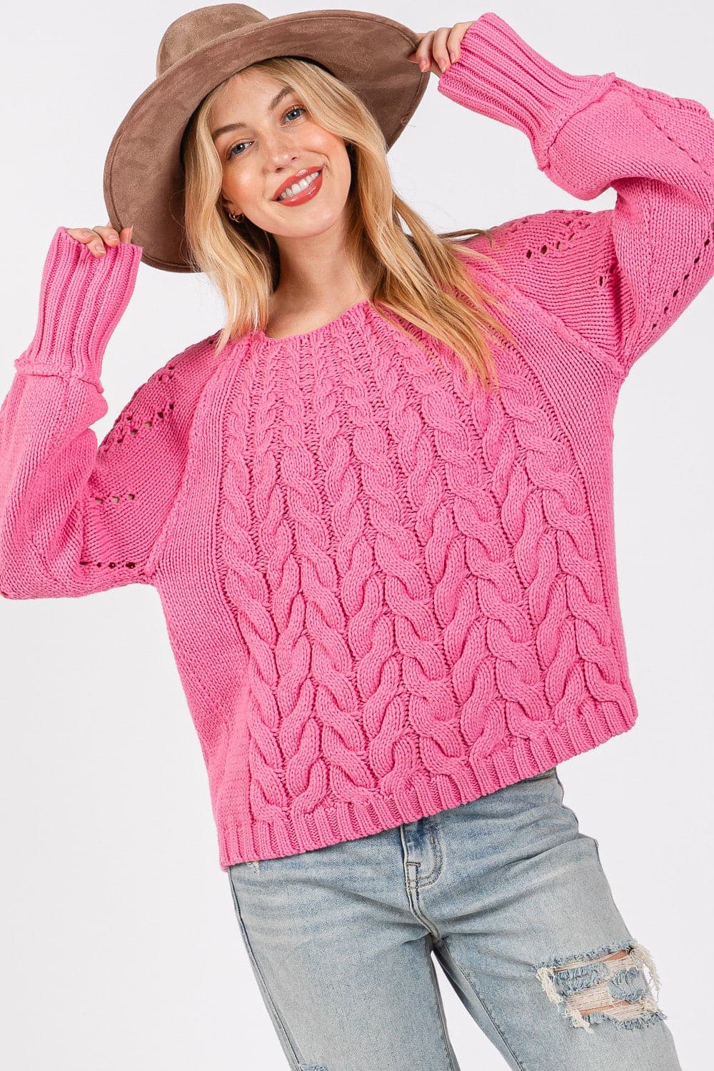 Cozy cable-knit oversized sweater with boat neckline