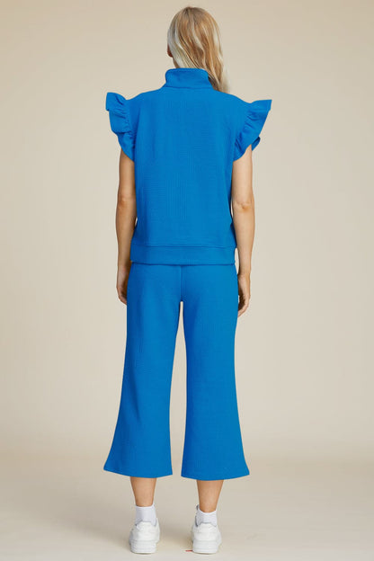 Double Take Full Size Texture Ruffle Short Sleeve Top and Wide Leg Pants Set.