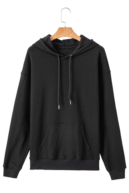 Cozy black fleece-lined hoodie with kangaroo pocket and drawstring design