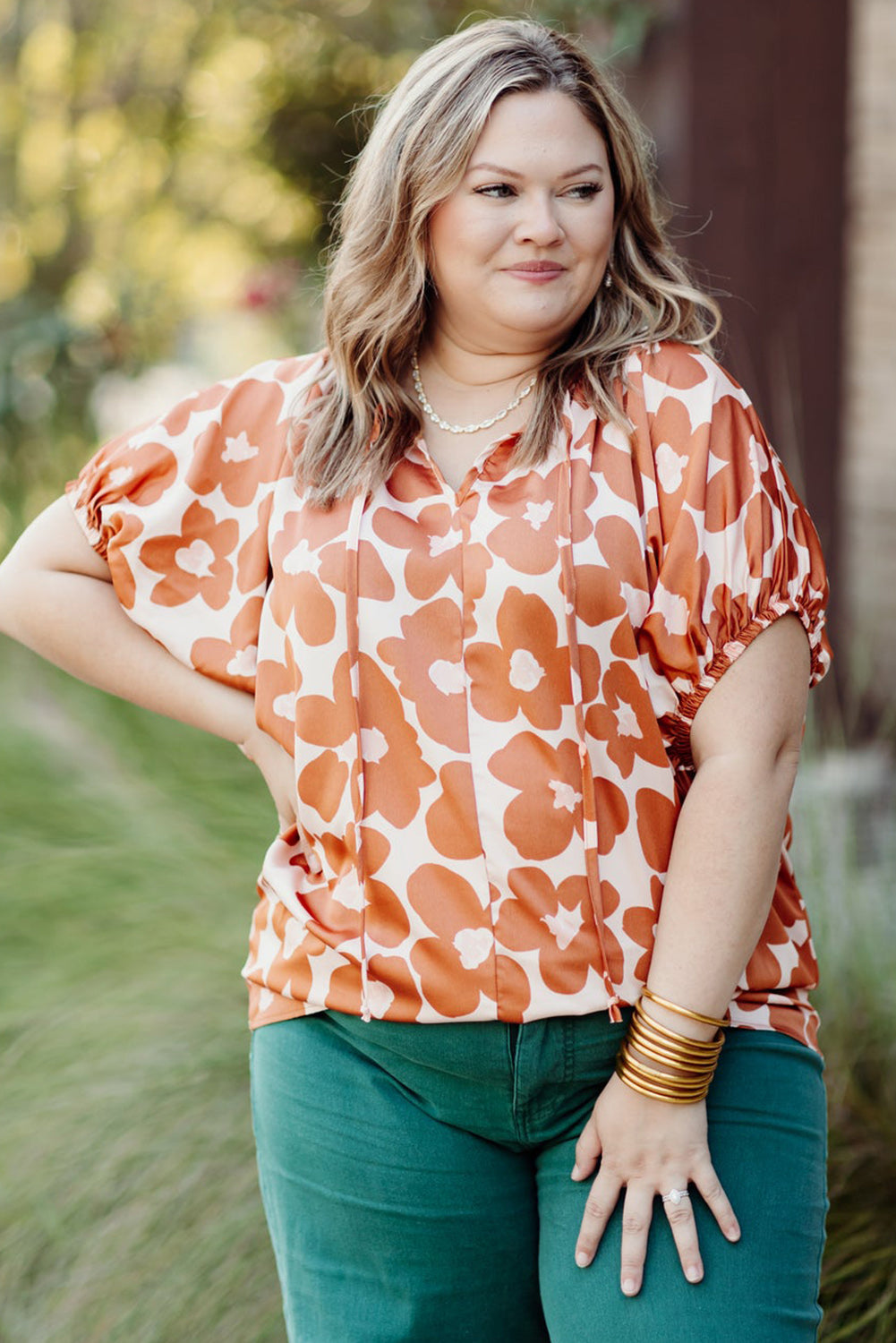 Floral Delight: Plus Size Orange V Neck Blouse with Drawstring Detail