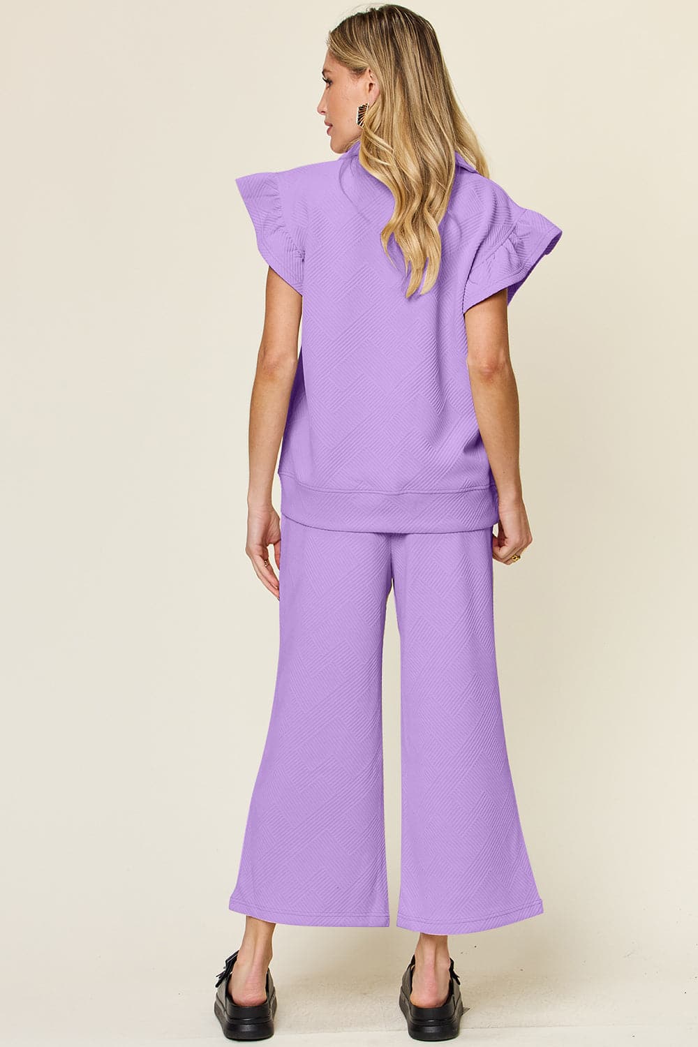 Double Take Texture Ruffle Short Sleeve Top and Drawstring Wide Leg PaFeatures: Drawstring, Pocketed
Number of pieces: Two-piece
Stretch: Slightly stretchy
Material composition: 97% polyester, 3% spandex
Care instructions: Machine washLove Salve Texture Ruffle Short Sleeve TopTwo-Piece Sets