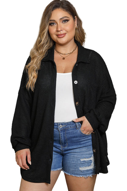 Chic black plus size pocketed waffle knit top