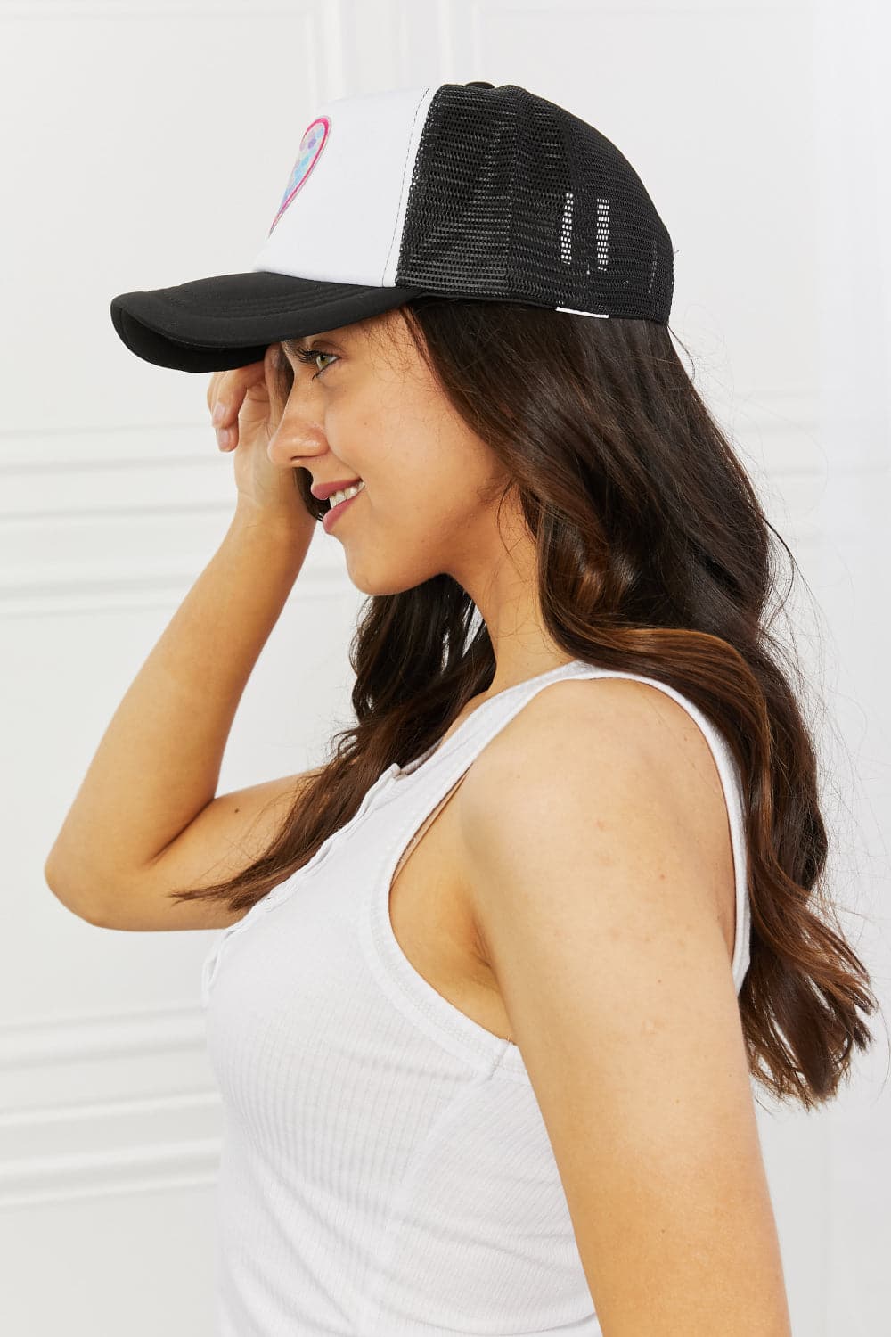 Fame Falling For You Trucker Hat in Black.