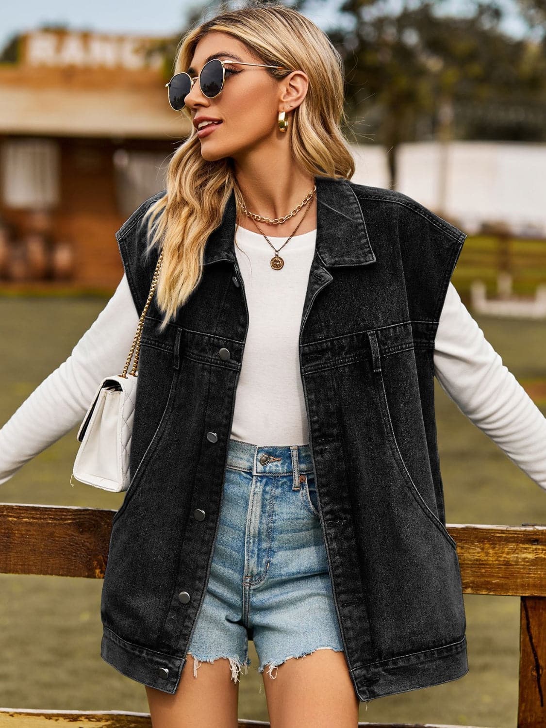 Button Up Collared Neck Sleeveless Denim Jacket.